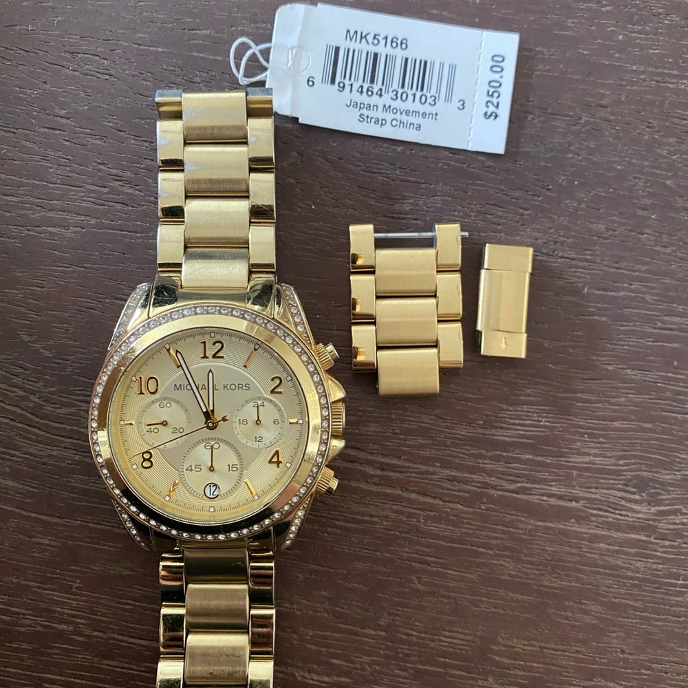 Michael Kors gold women’s watch w/ crystal detail